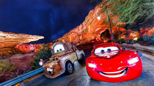 Sleeping Beauty Castle illuminated with 70th anniversary projections