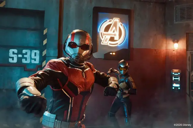 Castle view at Disneyland surrounded by tourists