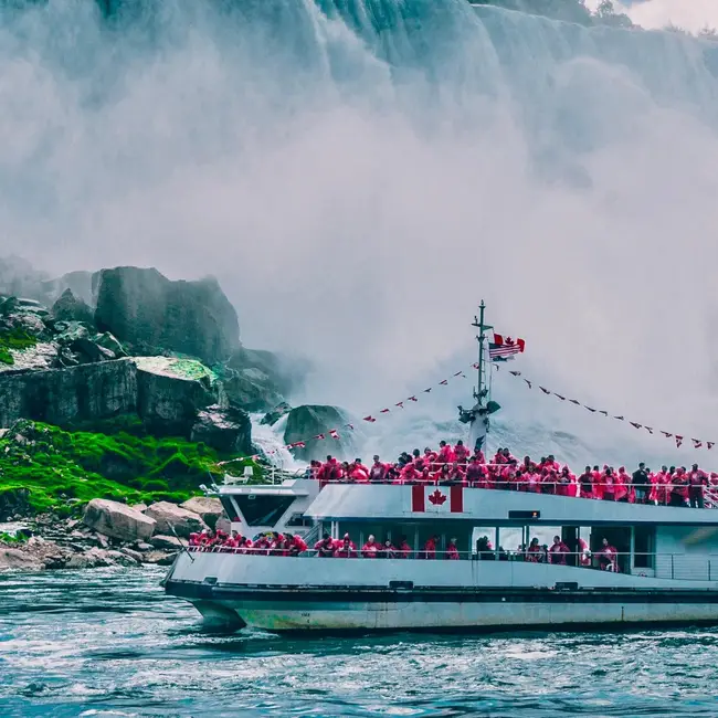 Mist and spray from the Horseshoe Falls covering the tourist boat
