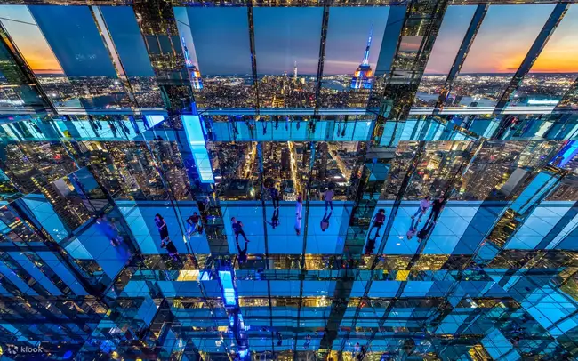 Panoramic view of the New York skyline at dusk through mirror effects