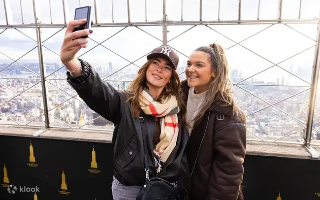 The high-tech glass elevator taking visitors to the 102nd floor