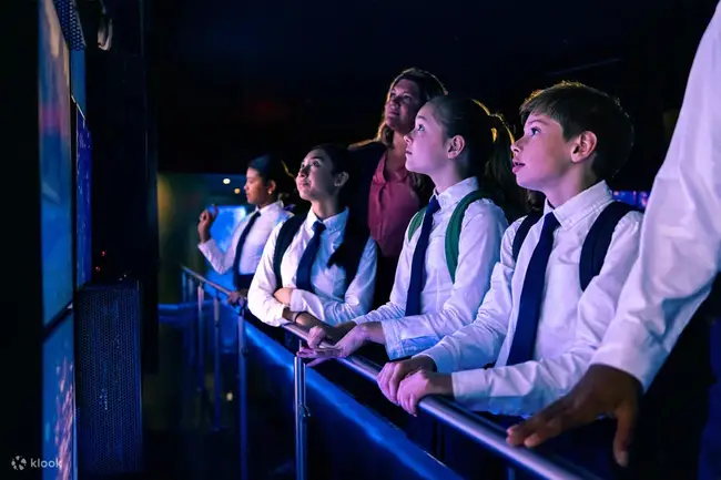 Interior view of One World Observatory in New York City looking toward the skyline