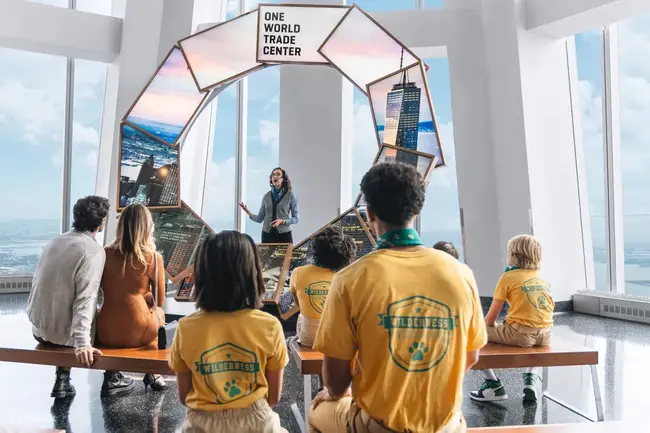 The SkyPod elevator with immersive LED screens showing history