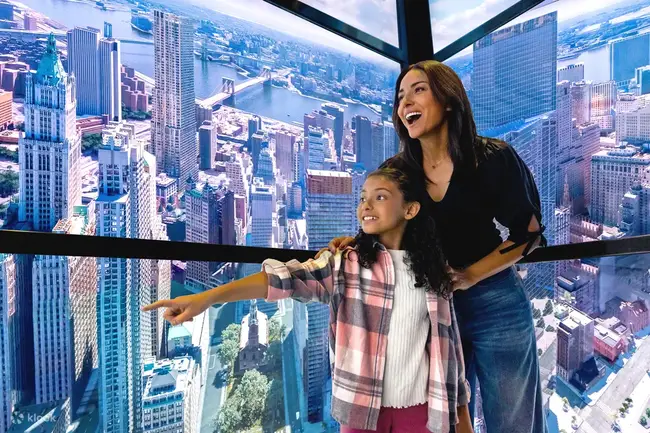 The Oculus building and 9/11 Memorial reflection pool